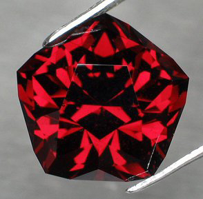 large red garnet faceted by a master