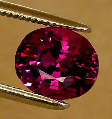 deep magenta pink oval sapphire
