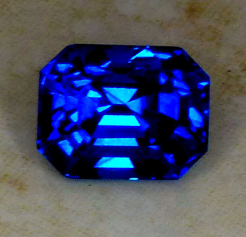 glowing blue sapphire emerald cut