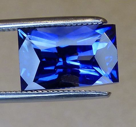 2.97ct emerald cut blue sapphire