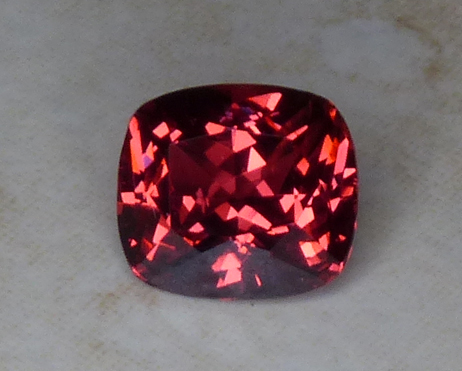 vivid salmon colored spinel