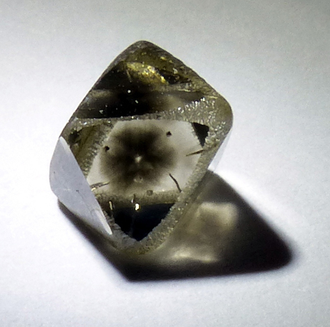 natural diamond crystal with hydrogen cloud