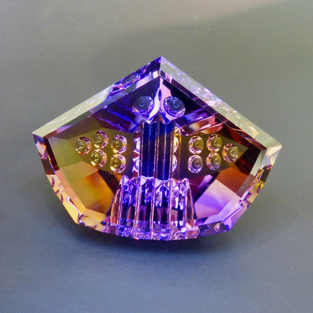70+ct fancy ametrine with optical dishes
