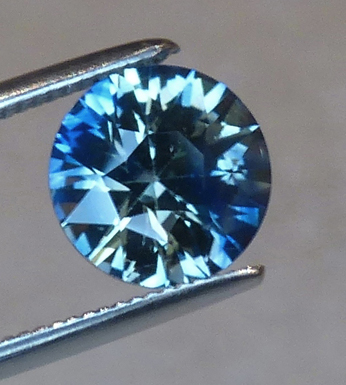 blue and yellow round sapphire