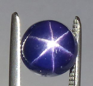 round purple star sapphire