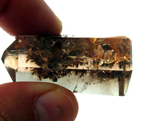 smoky quartz crystal with inclusions